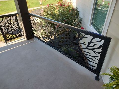 Custom steel railing fabricated, painted and installed for front porch.